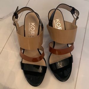 Michael Kors. 4 inch heel. Tan brown and black sling back shoes.